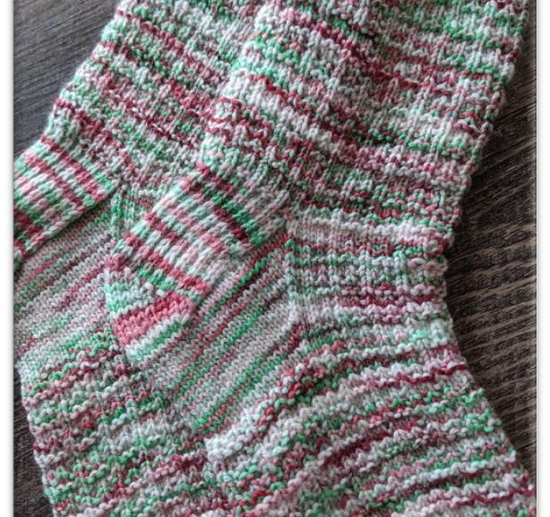 light green and pinkish red and ivory hand knit socks