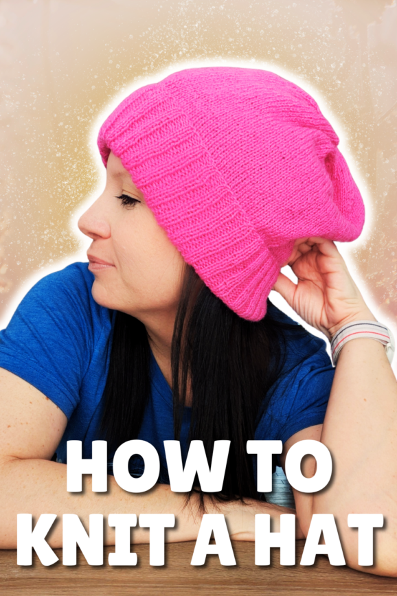 Girl wearing a bright pink slouchy knit hat